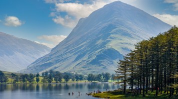 Buttermere Lake A serene lake of Buttermere surrounded by green hill in Lake District