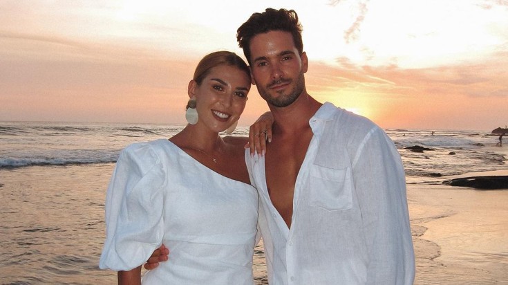 Raquel and Miguel during a sunset on the beach.