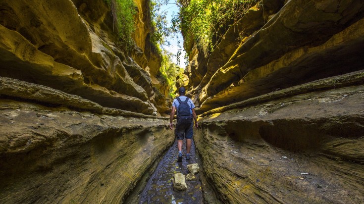 A man exploring the Hell's Gate in Kenya during winter.