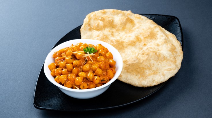 A serving of chole bhature; traditional Indian food originating in Punjab.