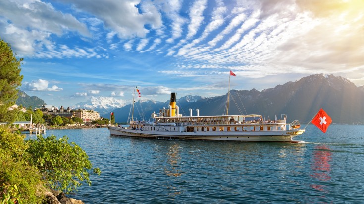 A ship full of tourists in Lake Geneva.