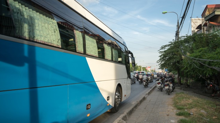 A tourist bus going from Hanoi to Hoi An.