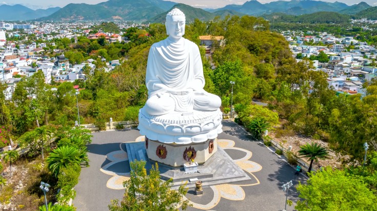 Aerial view big white Buddha in Long Son pagoda in Nha Trang, Vietnam in a summer day.