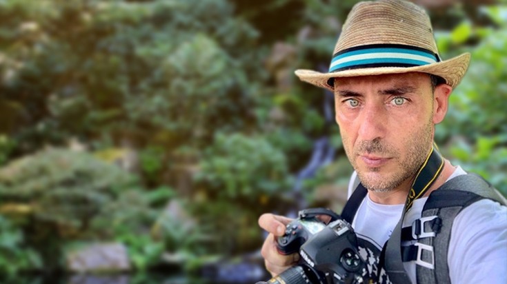Altug Galip with his camera poised for thrilling adventures.
