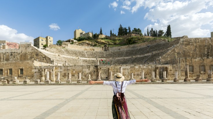 A girl enjoying the ancient city of Amman in Jordan during June.