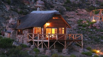 A family cottage at Dusk in Aquila Private Game Reserve.