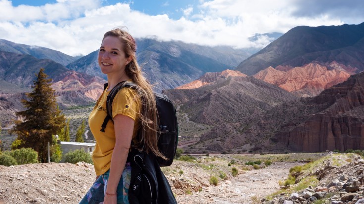 A young woman trekking in the mountains of Argentina.