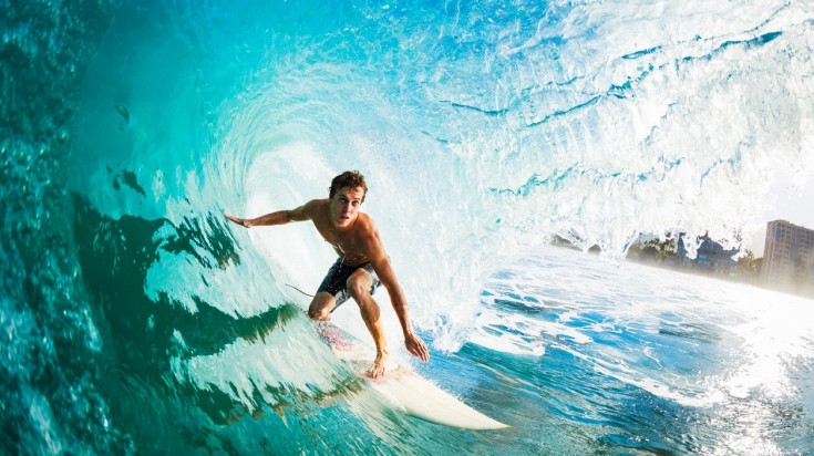 A surfer surfing on a trip to Australia