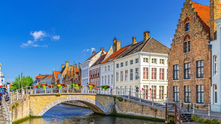 A warm sunny day at Saint Anna Canal in Bruges in Belgium in August.