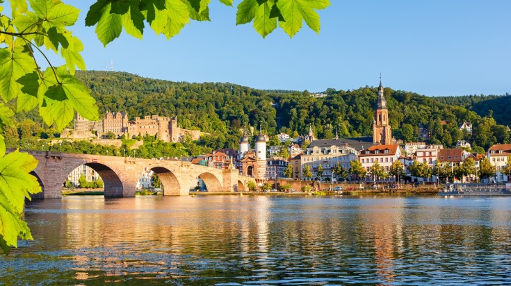 The Old Bridge over the Neckar River during a clear day.