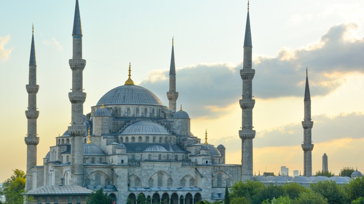 The Sultan Ahmed Mosque, also known as the Blue Mosque, is a must see while in Turkey. A view of the Blue Mosque at sunset.