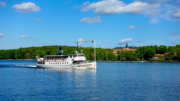 A boat floating in the waters of the Stockholm archipelago.