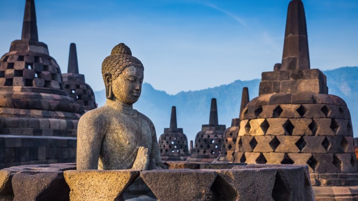 Borobudur, an Indonesian temple is popular for its open work stupas.