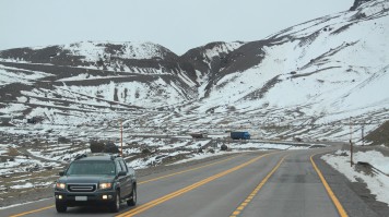 A car on international road between Santiago and Mendoza near border.