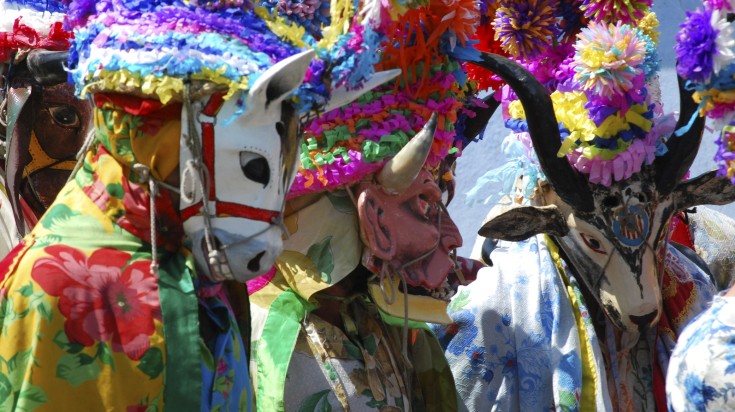 Masked performers during the summer festival, Carnival de Veracruz.