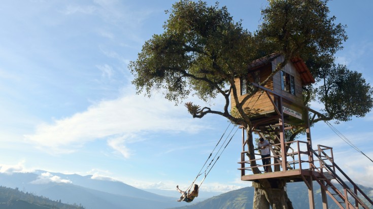 A woman on the Swing at the End of the World at Casa Del Arbol. A woman on the Swing at the End of the World at Casa Del Arbol.