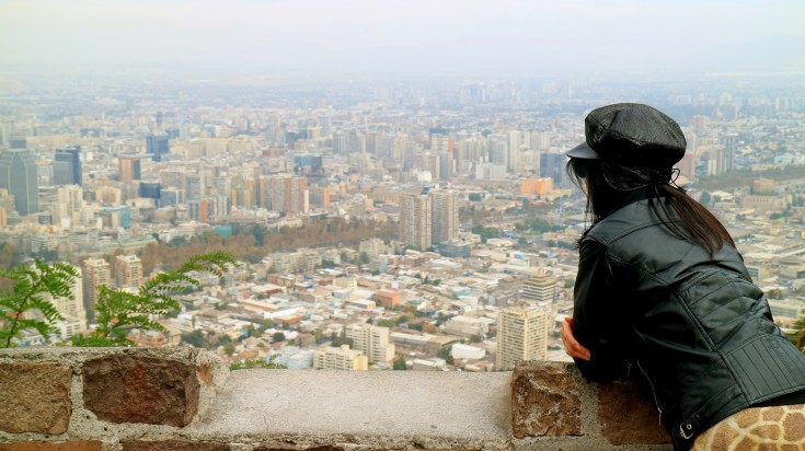 Woman enjoying the scenes of Chile in October's quiet times