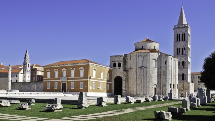 Visit the Church of St. Donat in July.