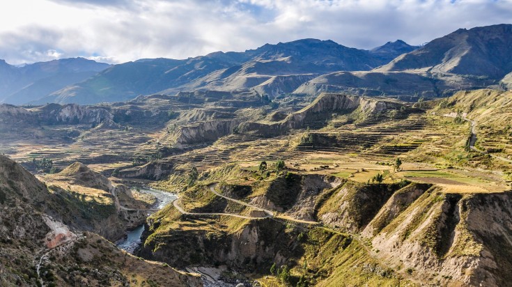 Panoramic view in the deep Colca Canyon on a cloudy day.