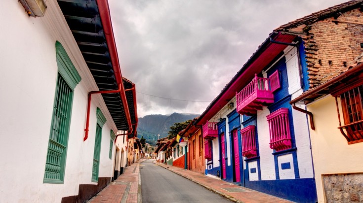 Vibrant facades of La Candelaria shacks in Colombia in May