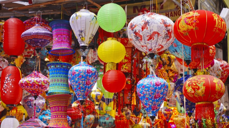 Colorful lanterns are displayed in the street market of Hanoi Old Quarter.