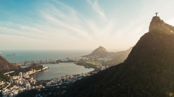 Aerial view of Corcovado Mountain during dusk in Rio De Janeiro, Brazil.