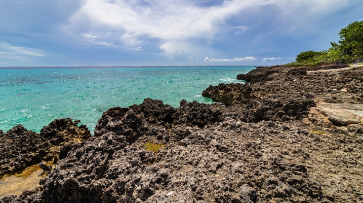 View of the Caribbean sea water in the rock coast - Bay of Pigs, Cuba