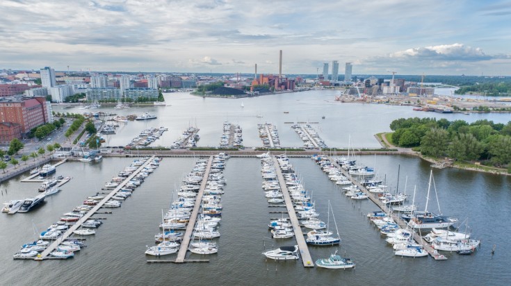 Electric boats and yachts parked in the port of Helsinki.