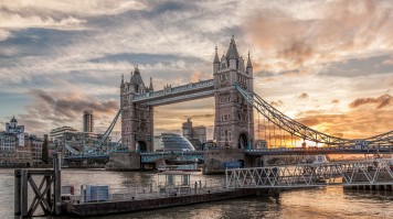 Visit the famous London Tower Bridge in England on your England and Scotland tour. The tower bridge in England during sunset.
