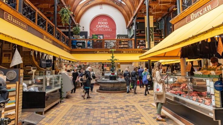 People shopping at the English Market, one of the top 10 things to do in Ireland.