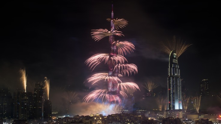 Fireworks near Burj Khalifa and other skyscrapers.