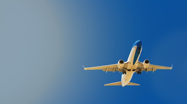 A plane flying in Buenos Aires sky, Argentina.