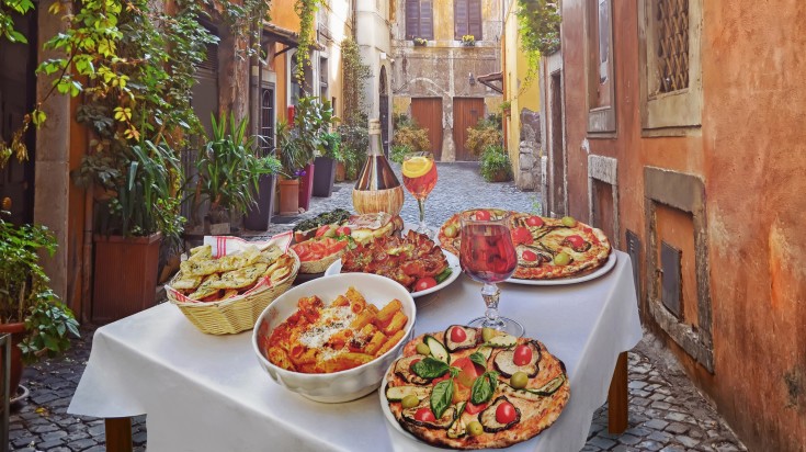 It is suggested not to drink anything apart from wine or water while dining in Italy.