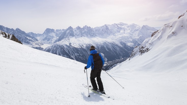 Skier skiing in the Alps mountains near Chamonix in France in March.