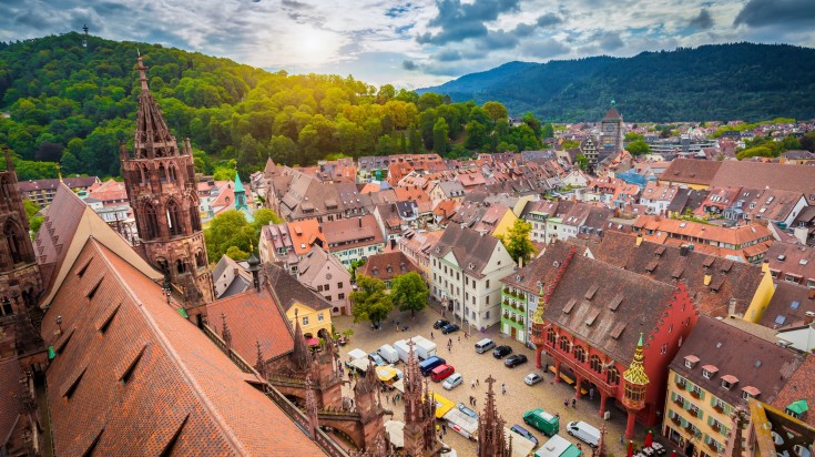 Aerial view of historic city of Freiburg during a gloomy day in winter.