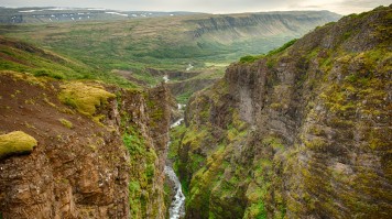 Glymur waterfall in Iceland drops to a majestic canyon