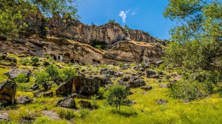 Hike the green landscape in Goreme National Park in March.