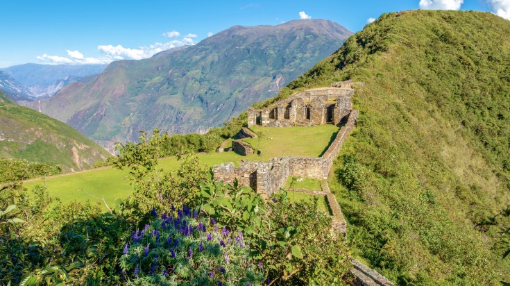 A view of the ruins of the Incan site in Peru atop a hill