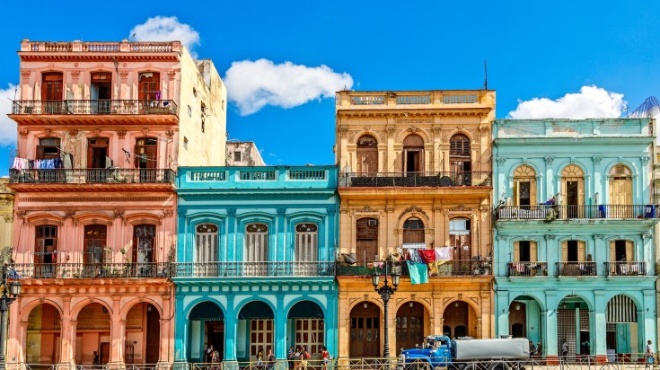 Old living colorful houses in the center of Havana on a clear day.