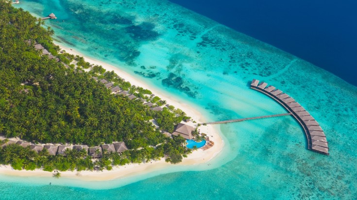 Aerial view of island and the sea in the Maldives.