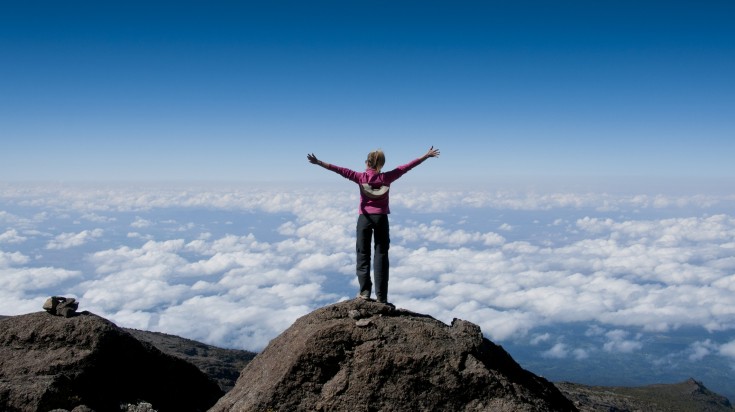 Hikers climbing Mount Kilimanjaro