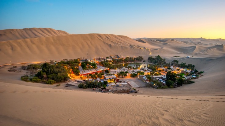 Huacachina, a desert oasis in the sand dunes of Peru.