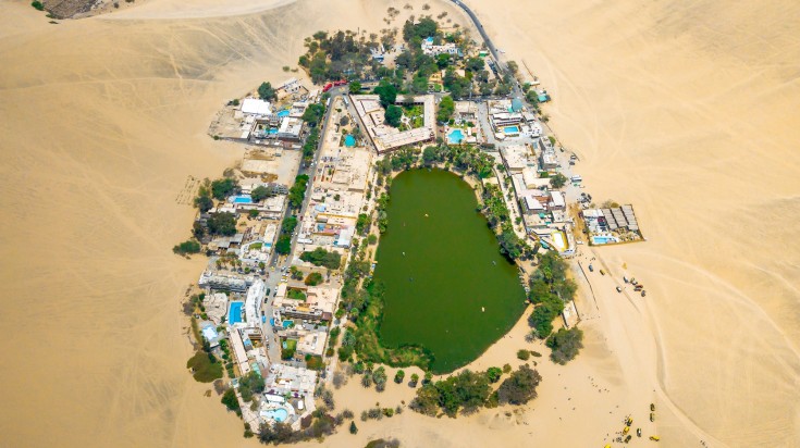 Huacachina is an oasis in Peruvian desert which you should visit in Peru.