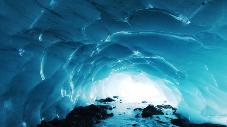 A naturally formed ice cave during winter in Iceland.