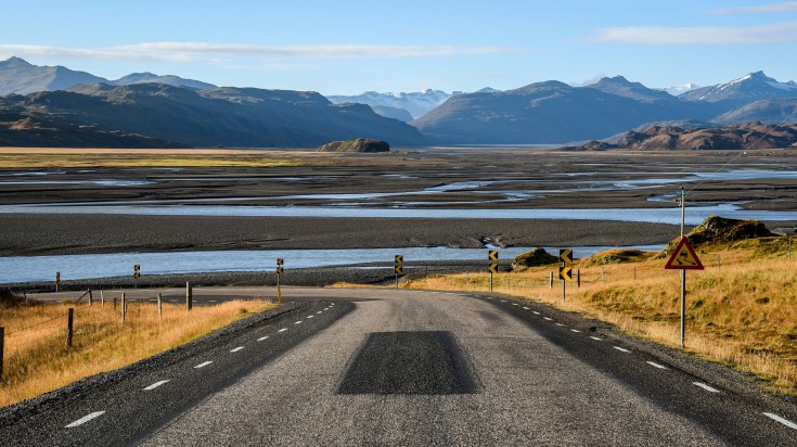 Iceland Ring Road passing through rivers and mountains.