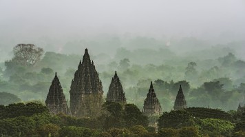 Prambanan temple viewed in foggy early morning, Indonesia in January