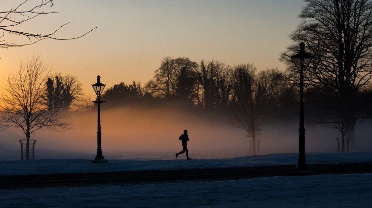 Runner in the misty Phoenix park