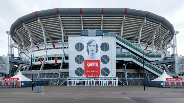 View of Johan Cruyff Arena on an overcast day in Amsterdam.