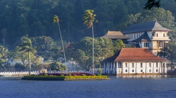 Kandy is a beautiful, peaceful mountain city that is also home to the tooth relic of Buddha Kandy is a beautiful, peaceful mountain city that is also home to the tooth relic of Buddha