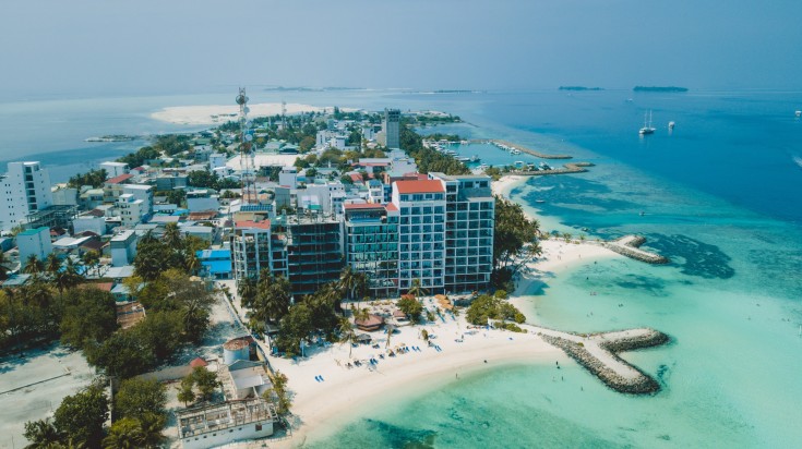 Maafushi Island aerial view in the Maldives. Maafushi Island aerial view in the Maldives.